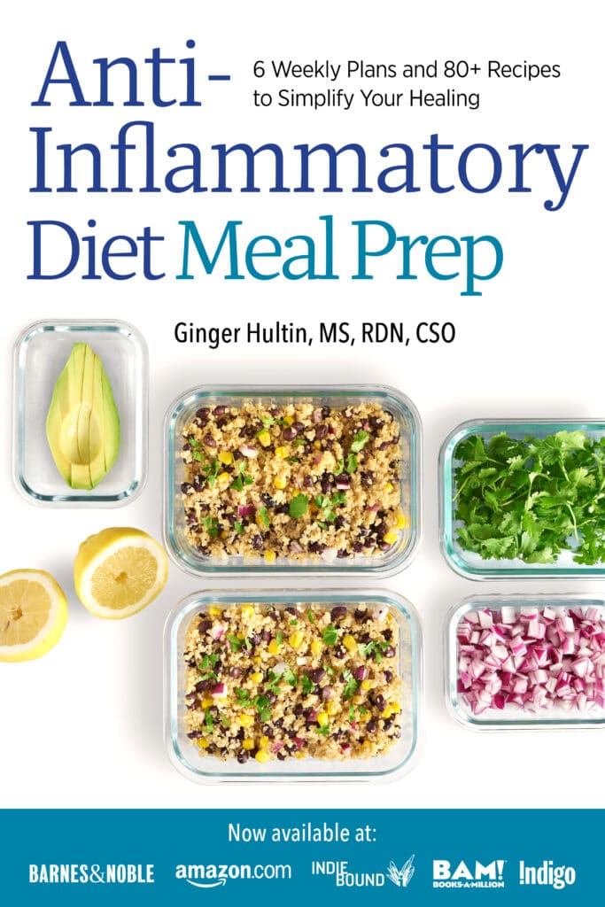 A meal prep book with a white and blue cover full of healthy food
