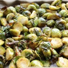 a large tray of crispy, vegetarian Brusssels sprouts